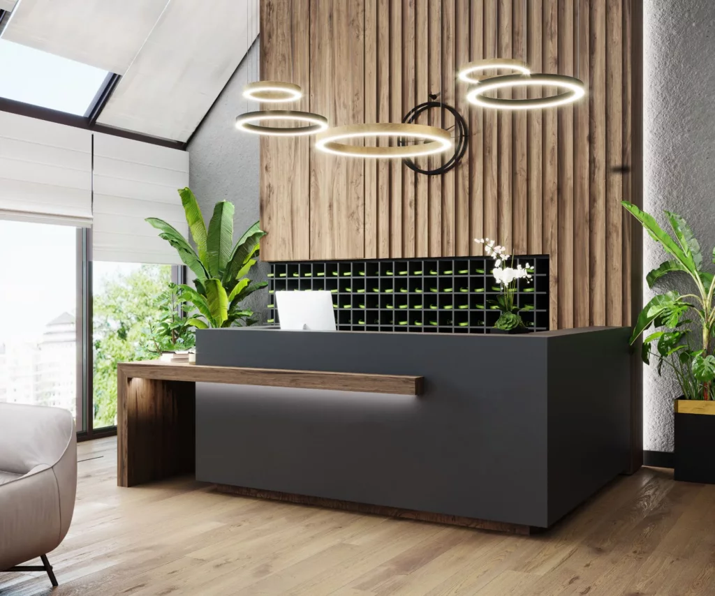 Charcoal reception desk with a walnut counter and slatted wood feature wall