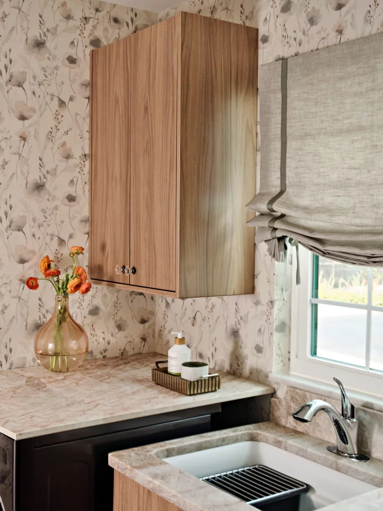 Integrated wine fridge in oak cabinetry