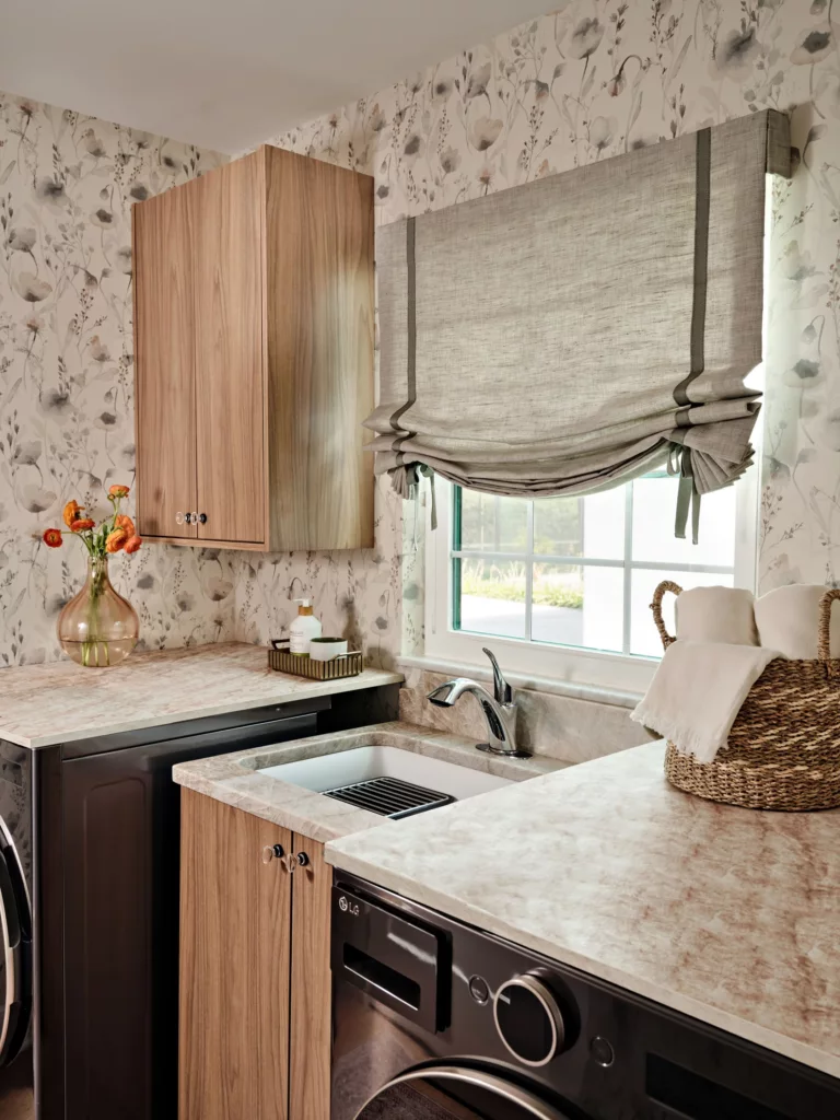 Oak wall cabinet over a laundry sink run