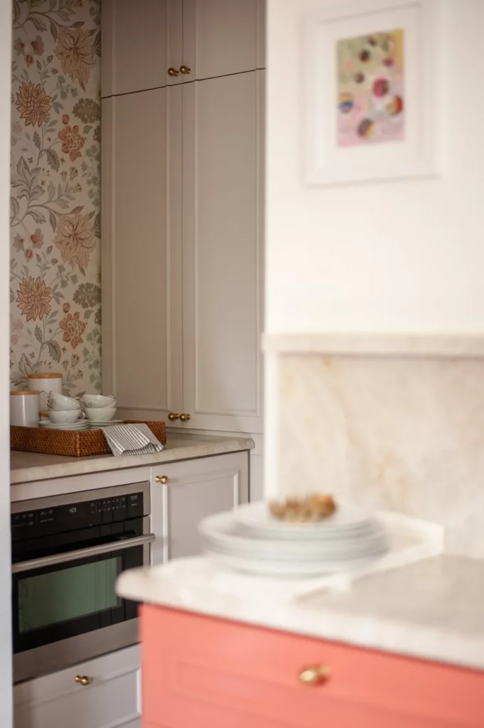 Open cabinet detail with plates and basket