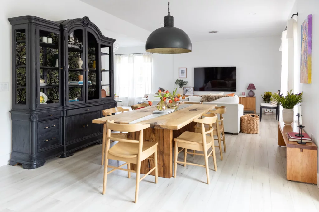 Dining space with black hutch and oak table