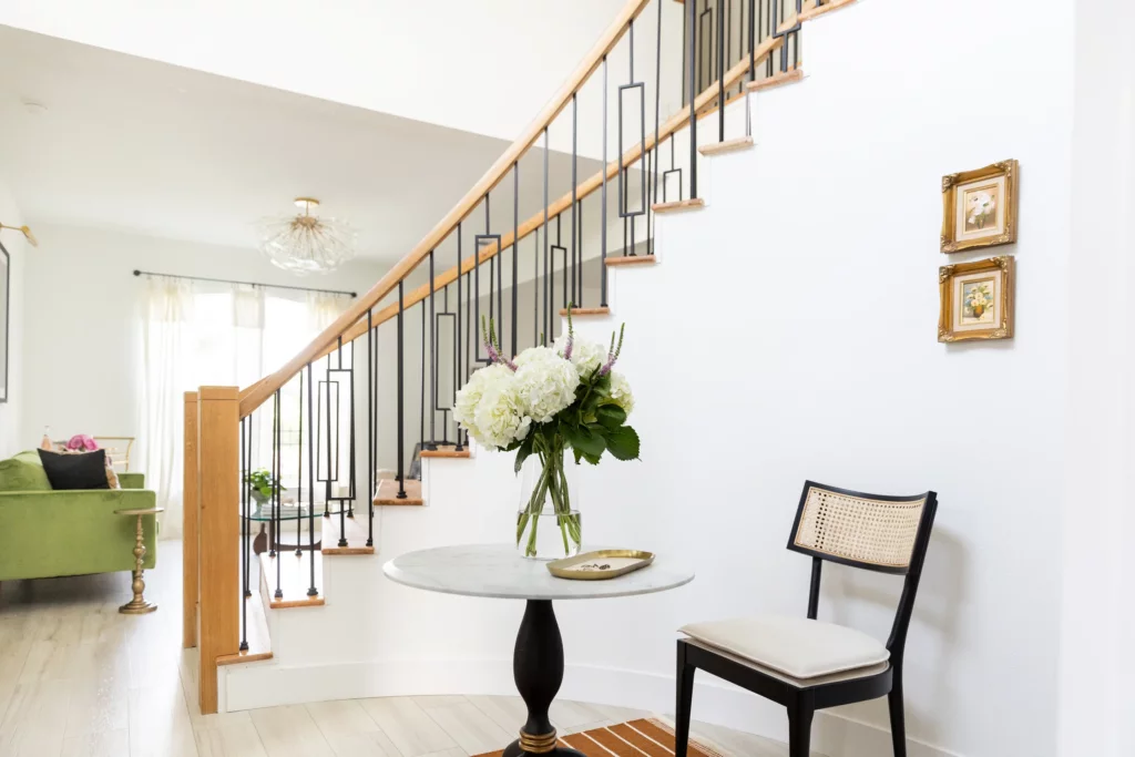Stair hall with built-ins and entry table